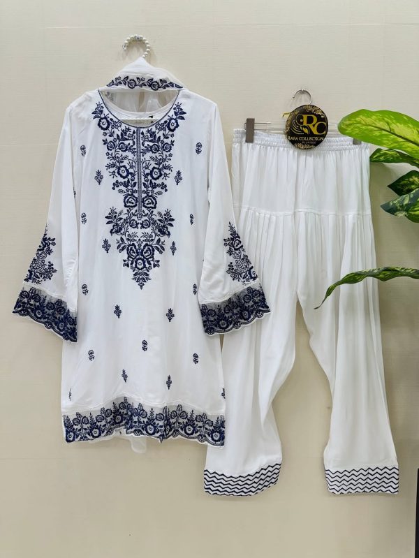 Code-0092 Hania Aamir vibes in timeless white _ blue 🤍💙_For price _ details_ comment ❤️ and we_ll DM you___This viral Farshi Salwar suit is your _1.jpg White Georgette A59
