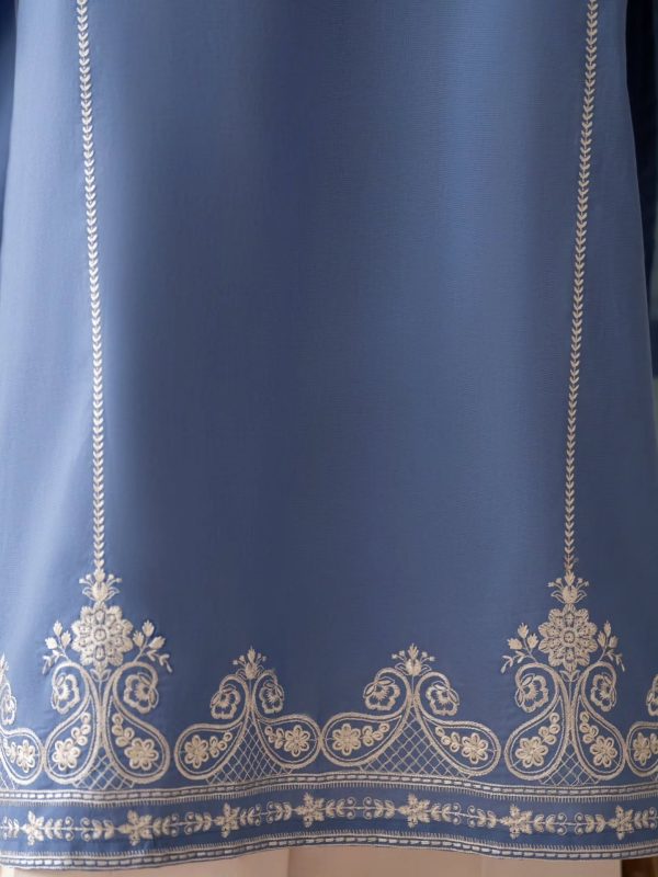 _Soraya___Step into serenity this Eid with Lazuli_s powder blue ensemble_ featuring a delicately embroidered shirt that radiates soft elegance. This grace_4 Royal Blue T21