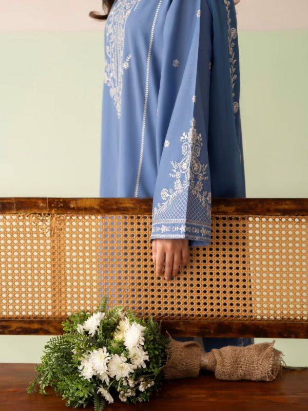 _Soraya___Step into serenity this Eid with Lazuli_s powder blue ensemble_ featuring a delicately embroidered shirt that radiates soft elegance. This grace_5 Royal Blue T21